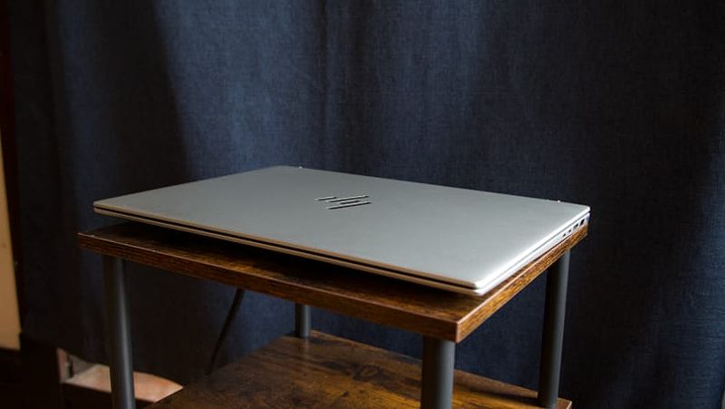 HP Pavilion Plus 16 closed atop a stool